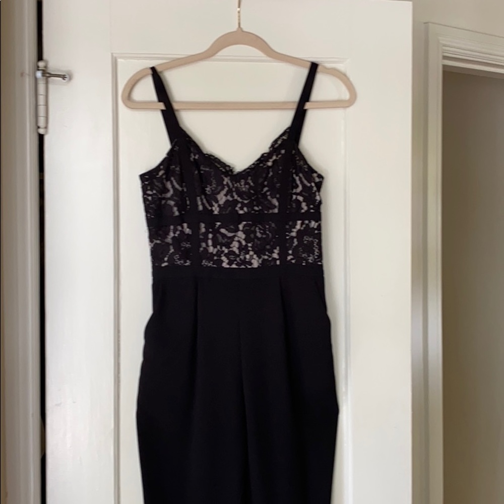 Sexy Spotlight by Warehouse lacy black jumpsuit.